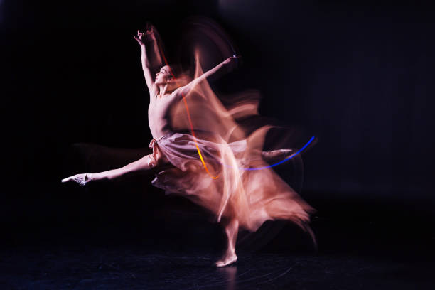 istock Pleasant skillful woman rehearsing a dance 878961920