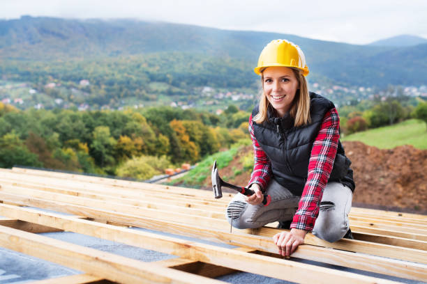 istock Young woman worker on the construction site. 878964242