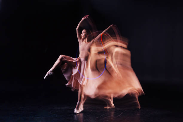 istock Pleasant young woman dancing 878964262