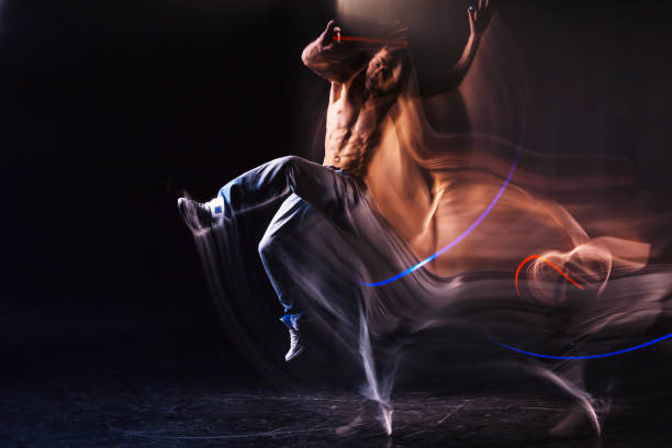 istock Attractive young man showing his dance 878964700