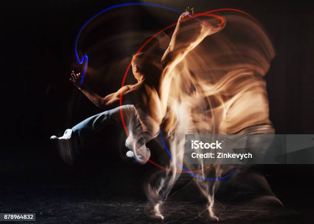 Attractive Skillful Man Showing His Mastery Stock Photo - Download Image Now - Multiple Exposure, Dancing, The Human Body