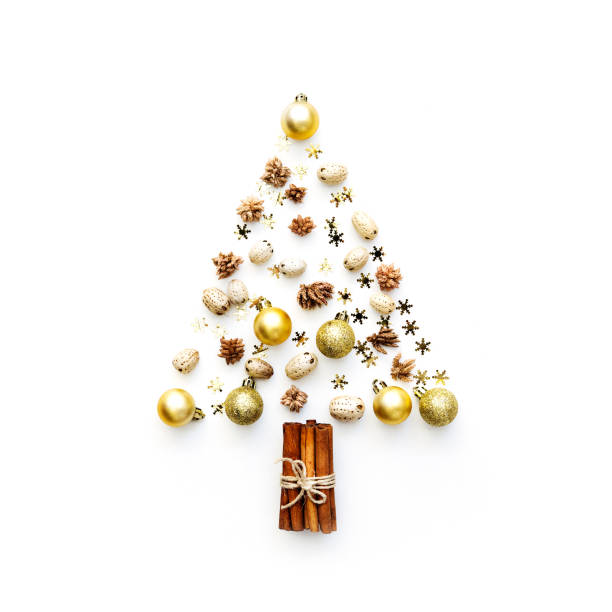istock Christmas tree made from decorations on white background. holiday and celebration creative concept. New Year and Christmas postcard or invitation. Flat lay 878969856