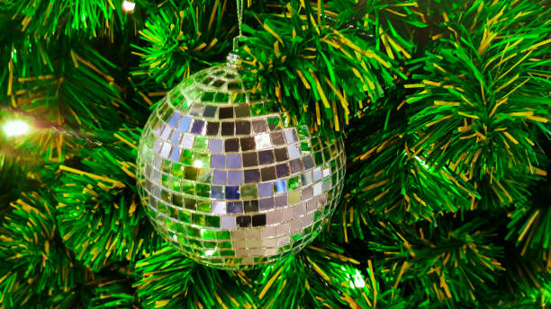 istock christmas tree with balls and lights 878969868