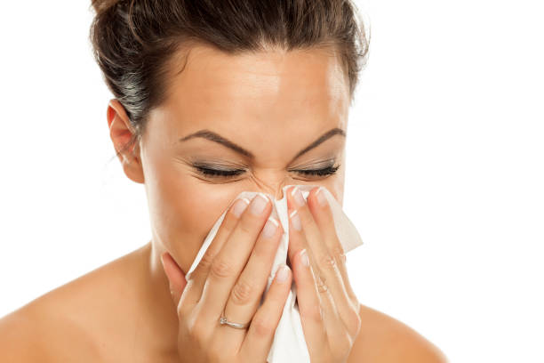 istock The woman snorted her nose in handkerchief 878981142