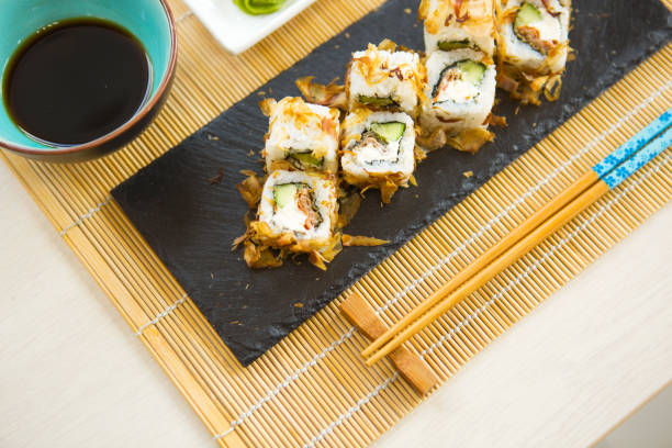 istock Hot Roll with Cream Cheese. Deep Fried Salmon outside. Salmon Fried Maki Sushi 878981670