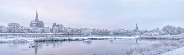 istock View on Kampen and river IJssel in winter in Holland 878993620