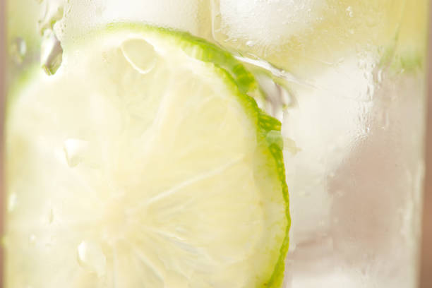 istock Drink for hot summer days. Fresh lime and lemon lemonade. Selective focus 879007918
