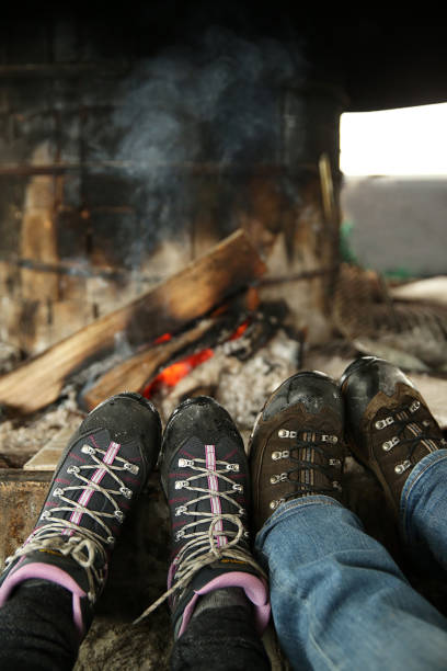 istock Resting Feet Beside the Fire Place 879009072