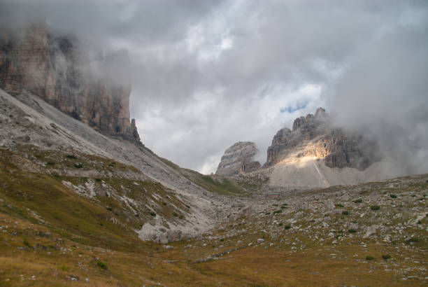 istock Clouds inbetween Three Peaks of Lavaredo and Monte Paterno 879011664