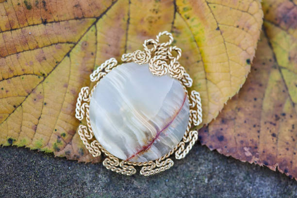 Natural stone jewelry pendant on the natural background