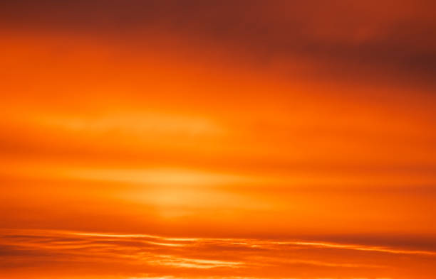 istock Beautiful fiery orange sunset sky as background 879024282