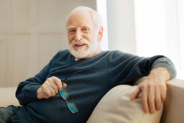 istock Portrait of delighted mature man that having rest 879025250