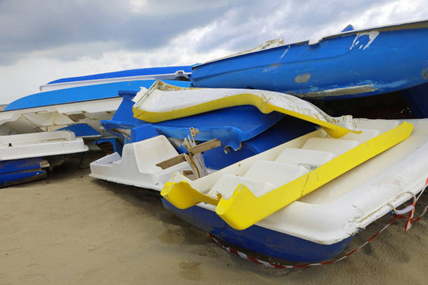 istock boats destroyed after landing illegal immigrants on the sandy be 879026868