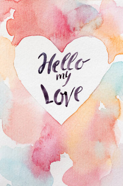 valentines day, love, celebrating concept. handmaden greeting card for all lovers day with multicolored background, clean center in form of heart and words that are written by calligrapher stock photo