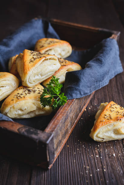 istock Baked rolls with sheep milk cheese filling 879028494