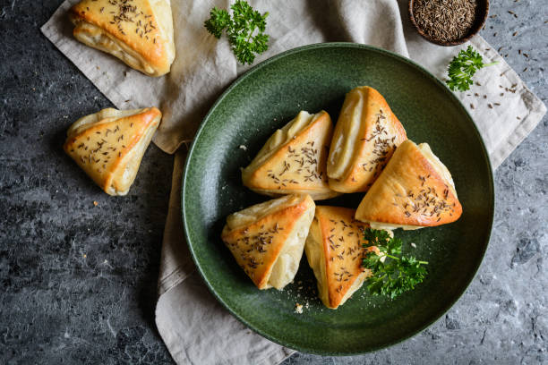 istock Baked rolls with sheep milk cheese filling 879028560
