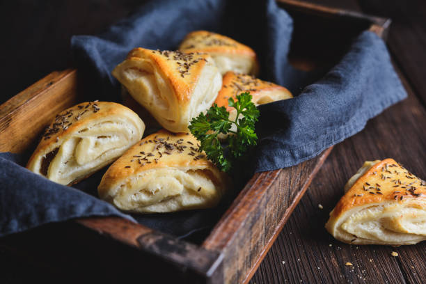 istock Baked rolls with sheep milk cheese filling 879028600