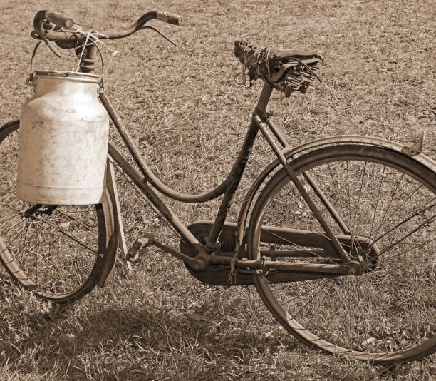 istock milking bike with bin for milk transport sepia effect 879041410
