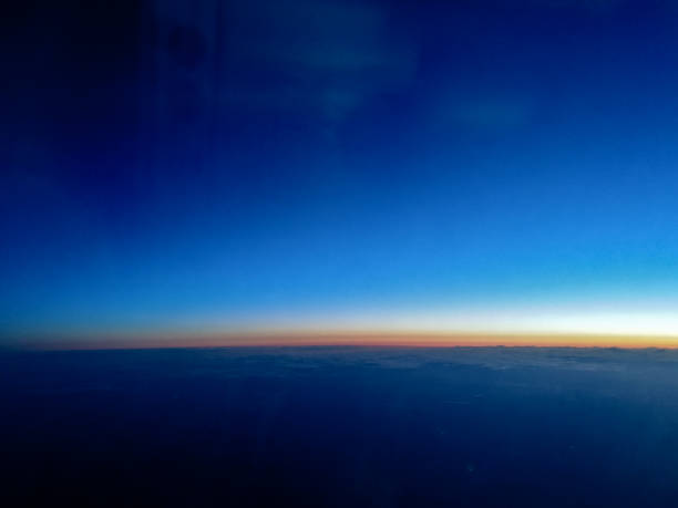 istock First light of Sun rise from 40,000 Ft above the ground 879054260