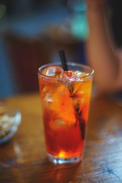 istock Refreshing traditional drinks on wooden table Spritz and sparkling water. 879065096