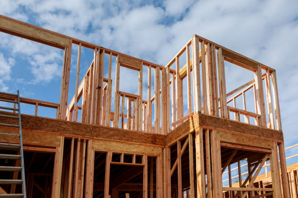 istock New residential construction home framing against 879066456