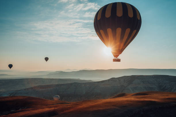 Free Stock Photo of Sunset Over Valley With Hot Air Balloons | Download ...
