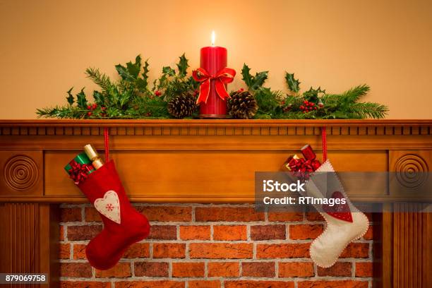 Christmas Stockings Hanging On The Fireplace Stock Photo - Download Image Now - Mantelpiece, Christmas, Fireplace