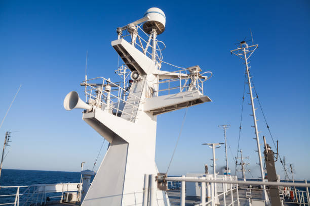 Color image of some antennas on the deck of a passenger ship.
