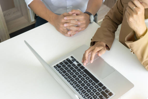 istock businesswoman working use computer with  employee 879081334