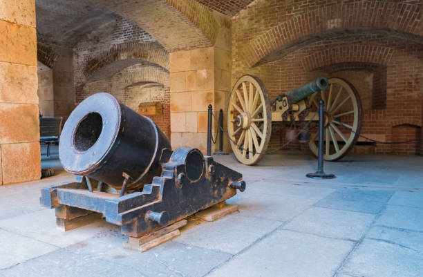 istock Two old cannon in Fort Point building 879086580