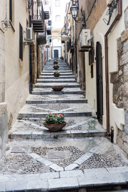 istock Stairway with ceramic pots in Cefalu,Sicily 879090948
