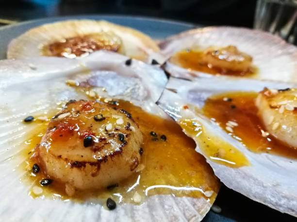 istock Giant grilled fresh Tasmanian scallops with fresh butter 879093494