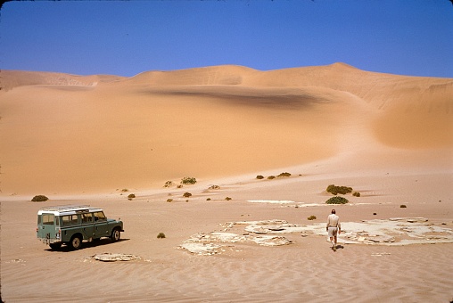 Namibia, 1973. Toure through Namibia with a Land Rover Defender. Short stop in the Namib Desert.