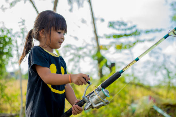 12,100+ Kids Fishing Pole Stock Photos, Pictures & Royalty-Free