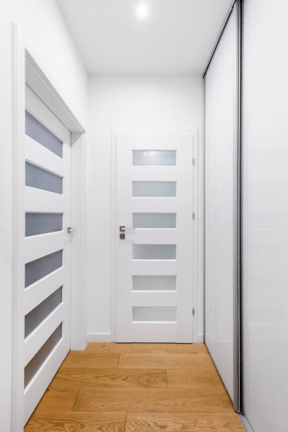 istock Hallway with white doors 879111766