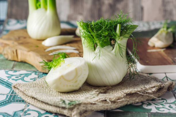 Fresh raw fennel Genuine and fresh raw fennel on a rustic background fennel stock pictures, royalty-free photos & images