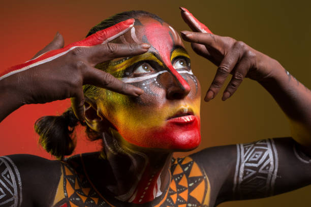 istock Bodypainting. Woman painted with ethnic patterns 879119694