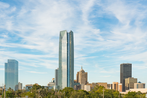 Skyline of Oklahoma City, OK during the day with cloudly sky