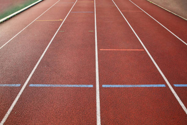 istock Finish lines - sign on the running track 879125314