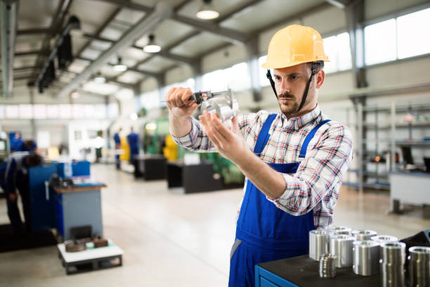 istock Supervisor doing quality control and pruduction check in factory 879133554