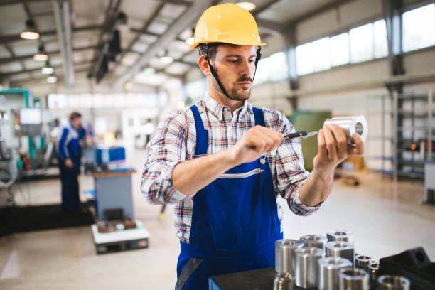 istock Male worker and quality control inspection in factory 879133800
