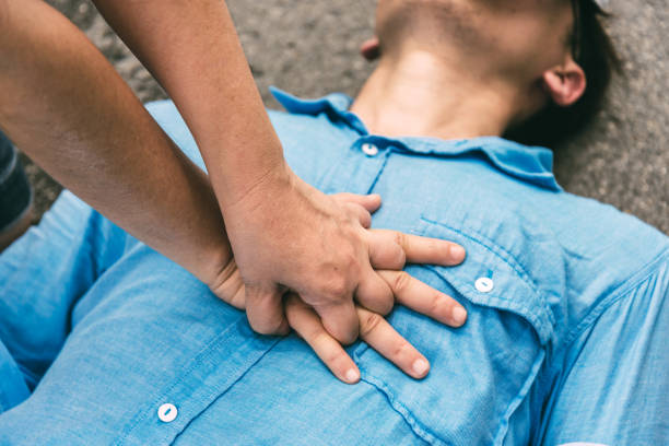 Emergency CPR on a Man who has Heart Attack , One Part of the Process Resuscitation (First Aid) Emergency CPR on a Man who has Heart Attack , One Part of the Process Resuscitation (First Aid) cpr stock pictures, royalty-free photos & images