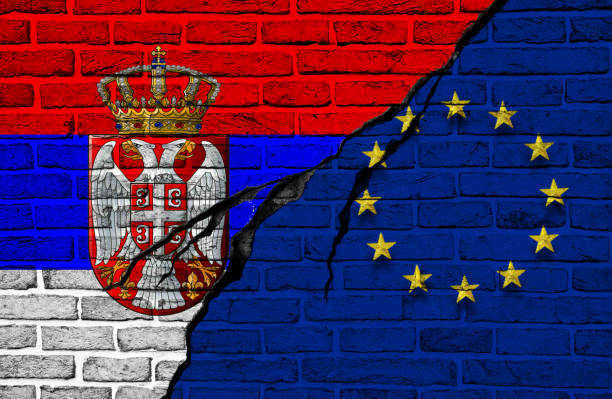 istock Serbian and European Union flag, conflict concept 879134586