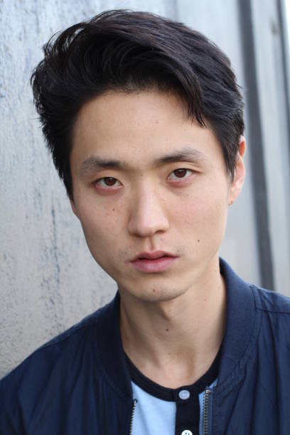 istock Asian man with noticeable dark circles 879151322