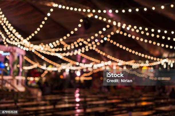 Blurred Beer Tent Stock Photo - Download Image Now - Traveling Carnival, Beer Festival, Lighting Equipment