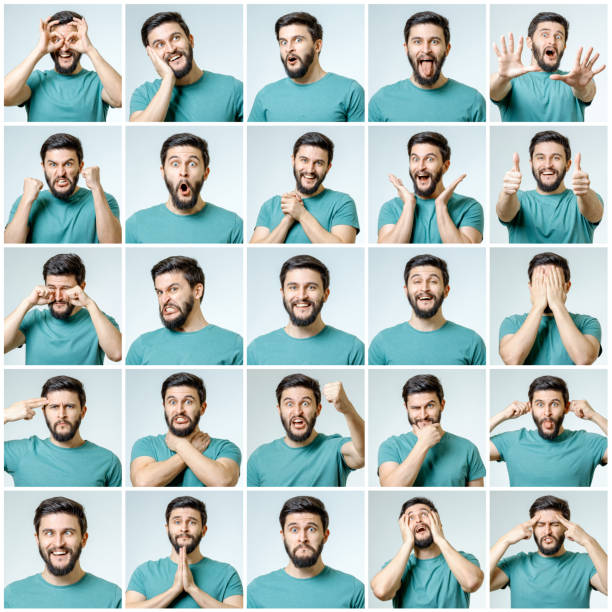 Set of young man's portraits with different emotions and gestures isolated
