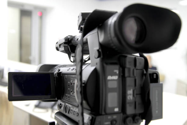 istock Blur of camcorder while filming. 879163684