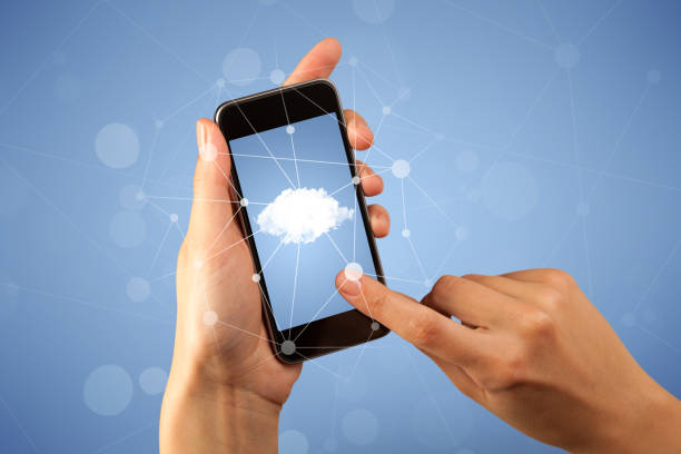 istock Female hand holding smartphone 879167302