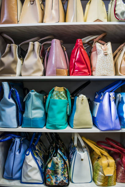 istock Different handbags on the shelves 879167626