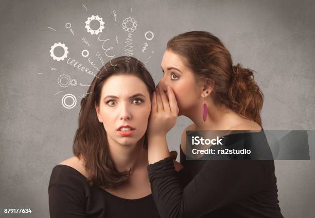 Girl Telling Secret Things To Her Girlfriend Stock Photo - Download Image Now - Actress, Adult, Beautiful Woman